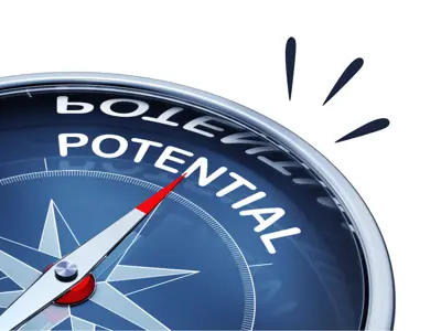 A compass pointing to the word "potential."