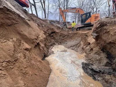 Crews work on the Lonsberry Drain culvert replacement project near Colchester