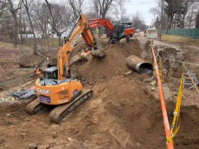 Crews work on the Lonsberry Drain culvert replacement project near Colchester