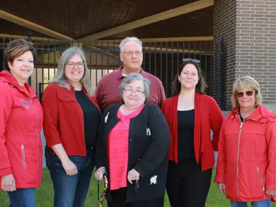 Members of the Essex County Accessibility Advisory Committee wearing red shirts.
