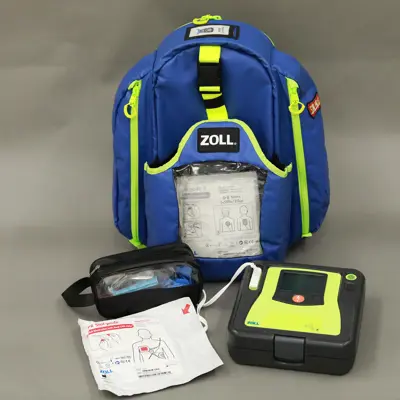 A portable AED with the pads, accessories and backpack.