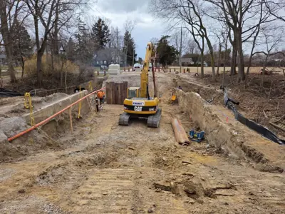 Crews work on the Lonsberry Drain culvert replacement project near Colchester